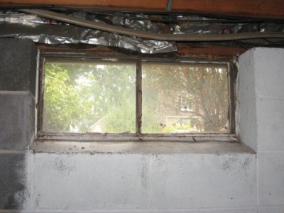 Before basement window repair